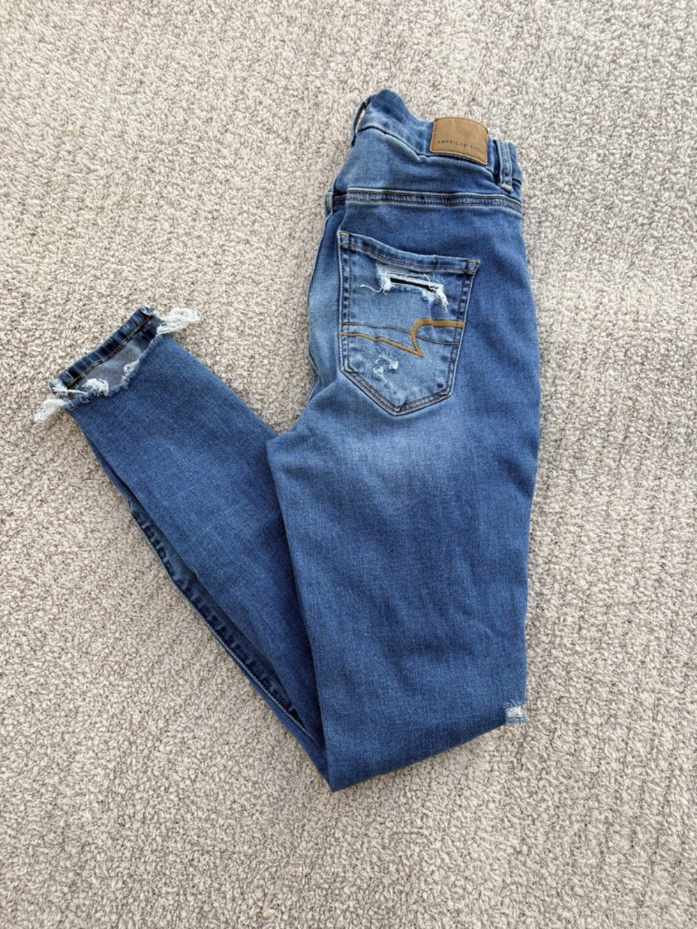 AEO Next Level Stretch Curvy Hi-Rise Jegging Ripped Distressed Skinny Jean